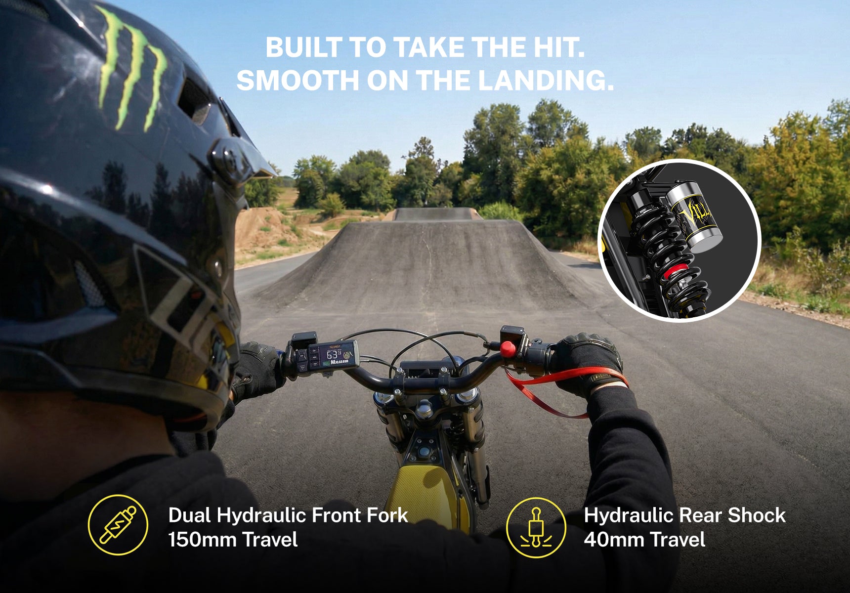 Heybike V1 electric dirt bike with 150mm dual hydraulic front fork and 40mm rear shock on a dirt jump track.
